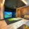 Multi-sport simulator lounge with basketball throwing game