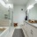 soaking tub and separate walk-in shower in well lit bathroom